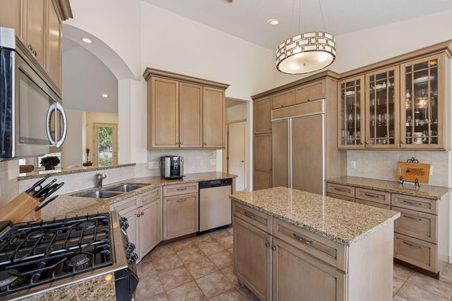 Spacious Kitchen with center island and lots of storage | Image 17