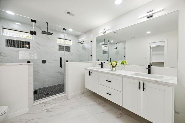 WOW-this spacious shower features two shower heads and a rain shower! | Image 13