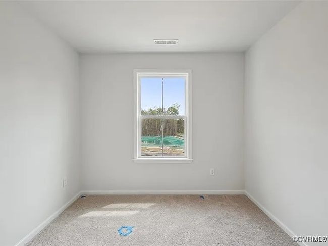 Spare room with light carpet | Image 19