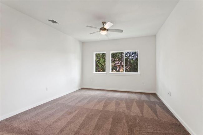 Spare room with carpet and a ceiling fan | Image 17