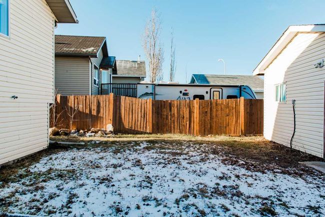 8842 66 Avenue, Home with 4 bedrooms, 3 bathrooms and 3 parking in Grande Prairie AB | Image 34