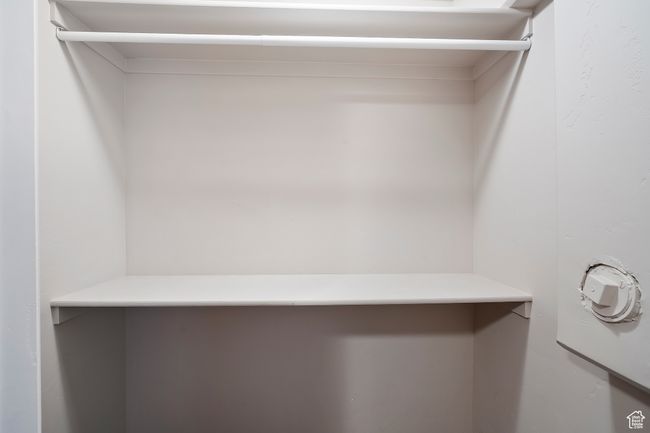 View of spacious closet | Image 25