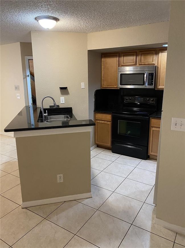 APT-1615 - 4524 Commander Dr, Condo with 2 bedrooms, 1 bathrooms and null parking in ORLANDO FL | Image 4