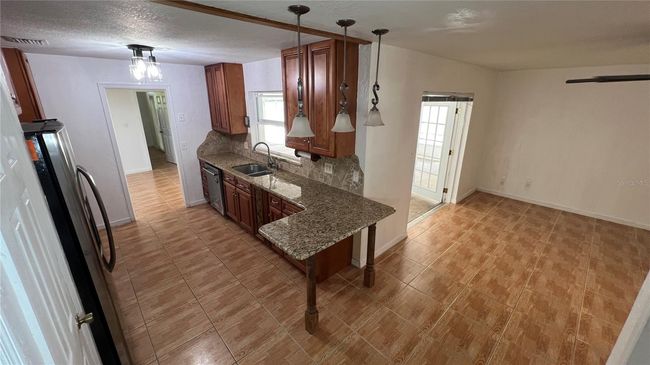7730 Broken Arrow Trl, House other with 3 bedrooms, 2 bathrooms and null parking in WINTER PARK FL | Image 14
