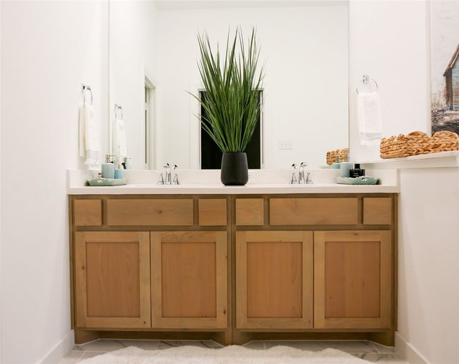 Bathroom with double vanity and baseboards | Image 27