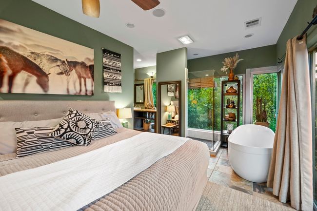 rare second primary bedroom with large long walk in closet with built inns | Image 32