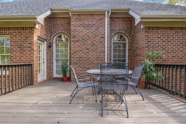 Enjoy dining, entertaining, or relaxing on your deck in peaceful backyard | Image 25
