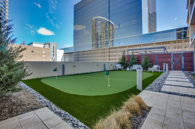 Surrounding community with an area to practice putting | Image 36
