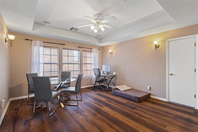Upstairs living area with vinyl flooring. | Image 19