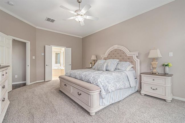 Neutral paint tones, crown molding and soft carpet under foot makes tip toeing as to not wake up someone that much easier! | Image 19