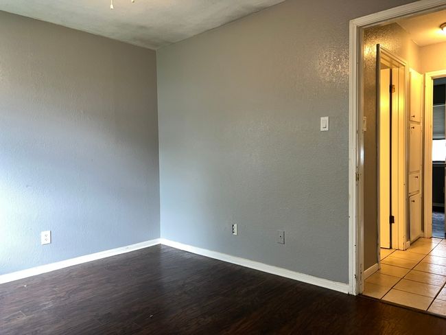 Empty room featuring wood finished floors and baseboards | Image 19
