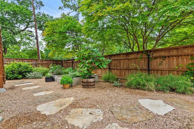 View of yard with a fenced backyard | Image 28