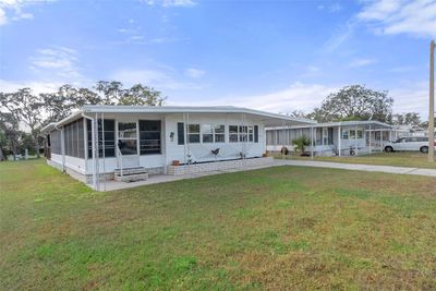 7477 Little Tee Lane, House other with 2 bedrooms, 2 bathrooms and null parking in Brooksville FL | Image 2