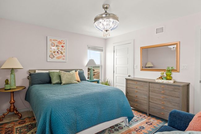Guest bedroom with ocean view from window laundry room closet | Image 23