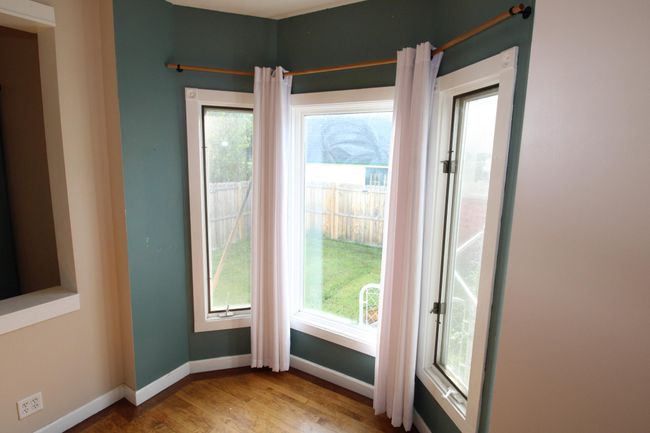 Bay Window looks out to side yard | Image 12