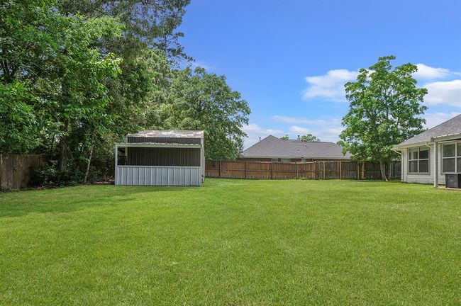 Fully fenced backyard | Image 24