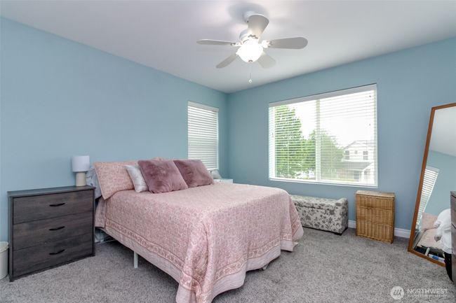 All bedrooms are good in size & have walk-in closets. | Image 16