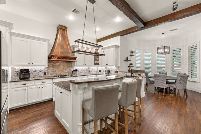 View of the Kitchen and breakfast nook in this open and spacious floorplan. | Image 15