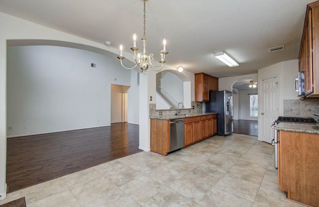 View of kitchen and living area from breakfast room. | Image 14