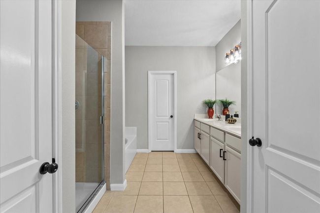 Transform your primary bedroom's ensuite bath into a personalized oasis of calm and comfort. | Image 17