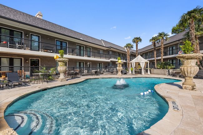 Pool featuring a patio area and fence | Image 26