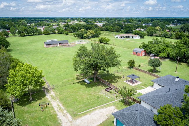 Bird's eye view of a tree filled landscape | Image 13