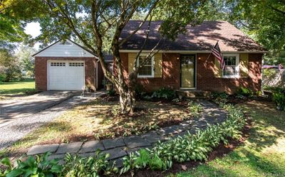 View of front of home featuring a garage | Image 1