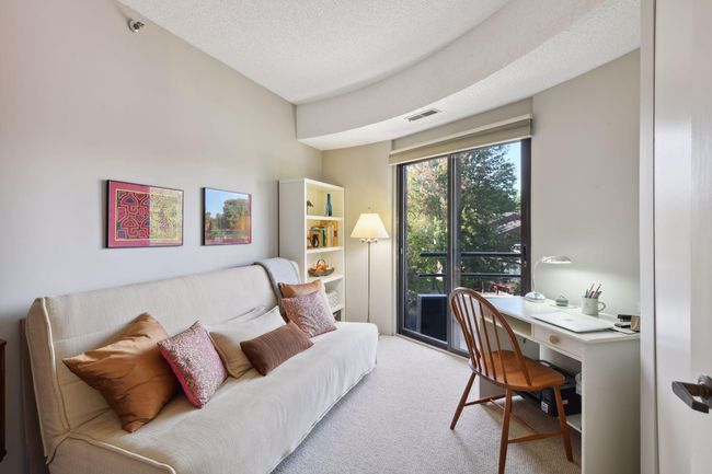 Second bedroom with a large closet and access to the balcony. | Image 16