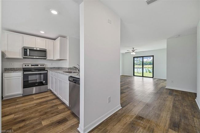 869 General Chesty Puller Ct, House other with 3 bedrooms, 2 bathrooms and 2 parking in LABELLE FL | Image 7