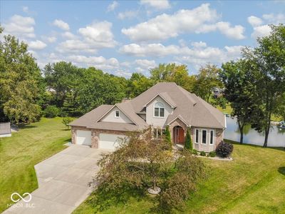 Beautiful lakefront home on a cul-de-sac with great curb appeal & updated landscape | Image 1