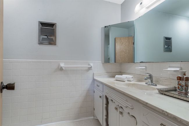 Hollywood mirror with storage graces the vanity | Image 28