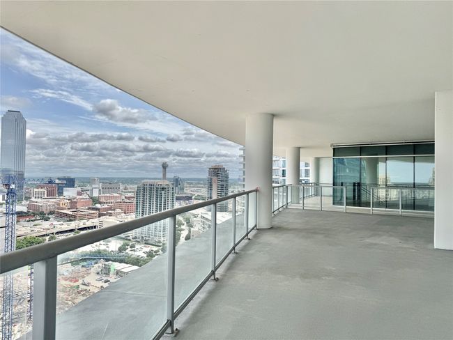 Balcony featuring a city view | Image 12
