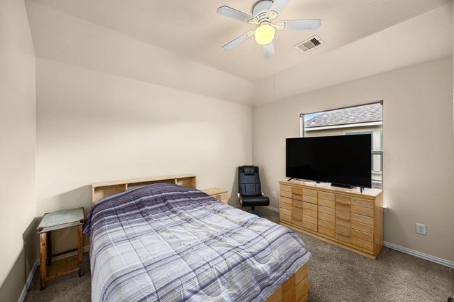 The second guest bedroom upstairs, with large closets for your guest or storage. | Image 29