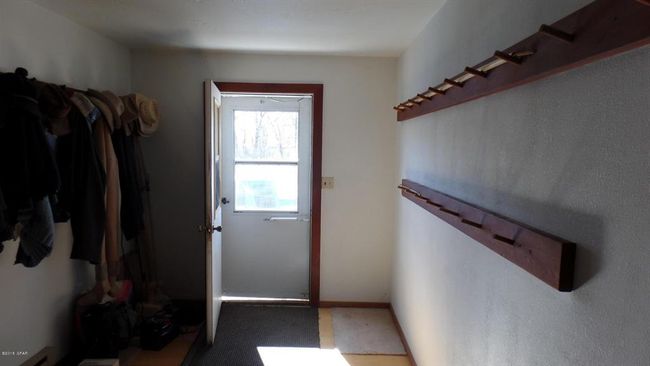 Entryway featuring coat racks for each unit | Image 22