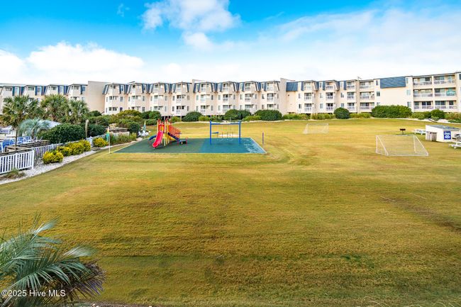 Family friendly common area with pool & playground | Image 30