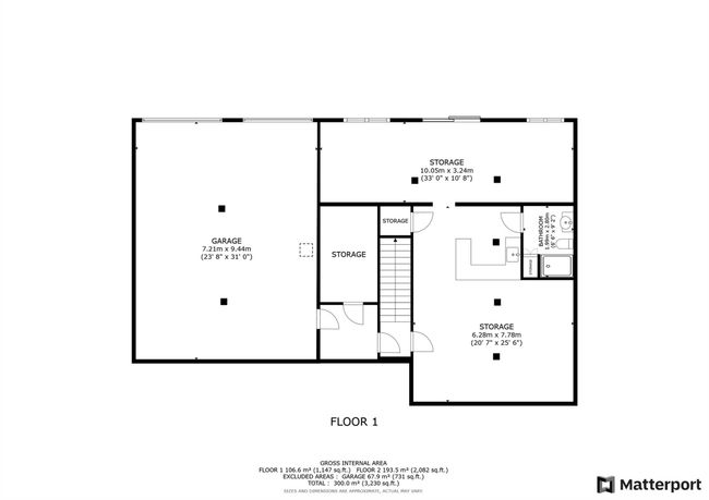 Kitchen with lofted ceiling with skylight, light wood finished floors, appliances with stainless steel finishes, and a center island | Image 7