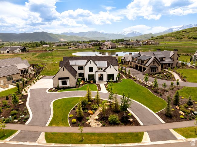 Aerial perspective of suburban area featuring a water and mountain view | Image 64
