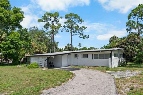 340 Timbruce Ln Nw, PORT CHARLOTTE, FL, 33952-6642 | Card Image