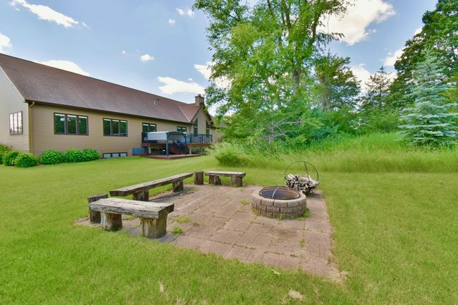 Back view with deck and patio/fire pit | Image 35