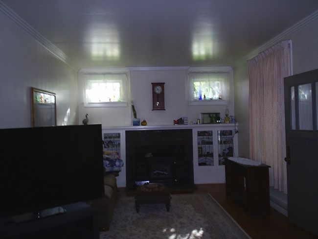 Living room featuring hardwood / wood-style flooring and crown molding | Image 11