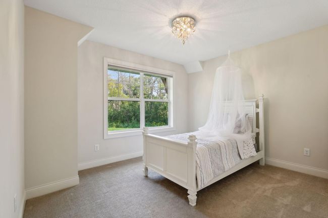 One of four bedrooms located on the Upper Level | Image 32