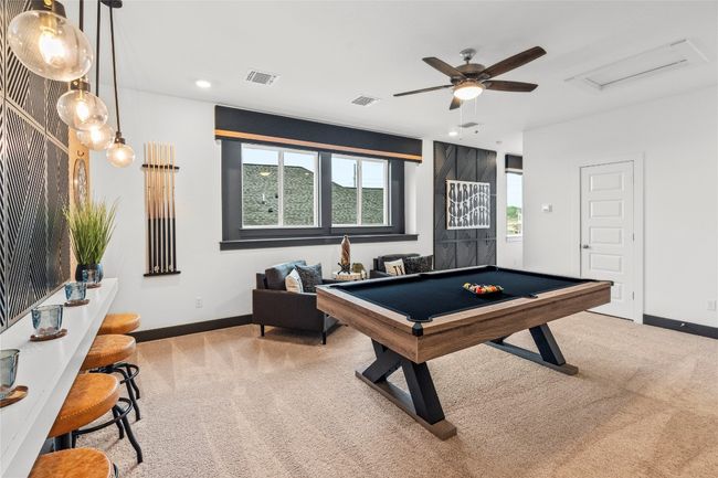 Recreation room featuring carpet, pool table, attic access, recessed lighting, and a ceiling fan | Image 7