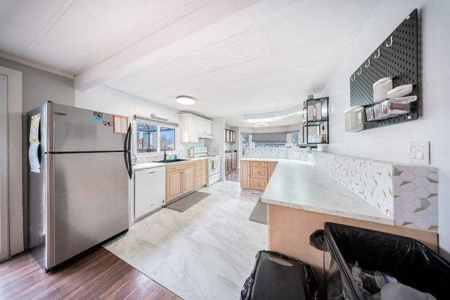 40 Hearthstone Dr, House other with 3 bedrooms, 2 bathrooms and 2 parking in Lacombe AB | Image 14