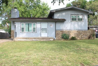 View of front of home featuring a front yard | Image 1