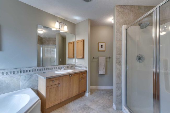 144 Westland Street, Home with 4 bedrooms, 3 bathrooms and 4 parking in Okotoks AB | Image 22