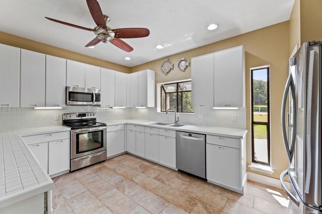 Open kitchen with SS appliances. | Image 12