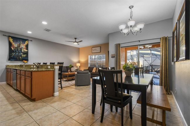 8963 Coco Palm Rd, Townhouse with 4 bedrooms, 3 bathrooms and null parking in KISSIMMEE FL | Image 4