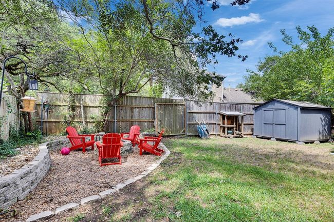 View of yard featuring a fire pit | Image 34