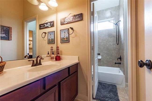 2nd Jack and Jill vanity area. Tile shower/tub combination. | Image 41