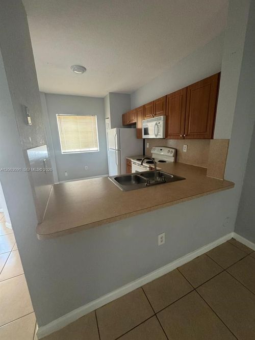 8811-8811 S Isles Cir, Tamarac, FL, 33321-4406 | Card Image